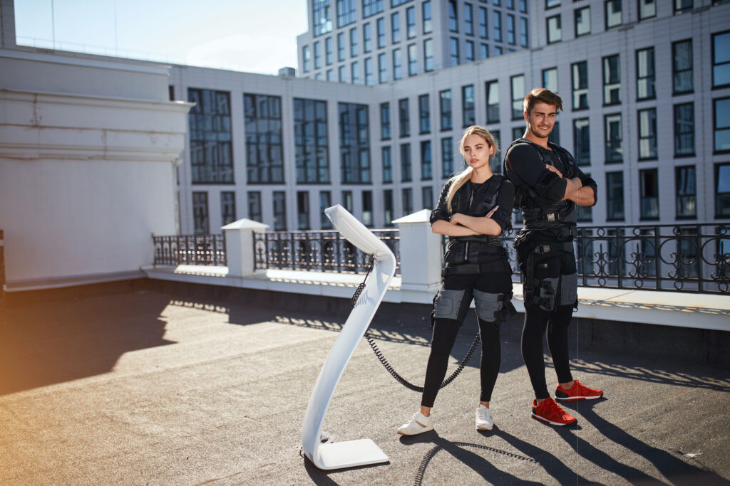 attractive Caucasian woman and man are posing to the camera