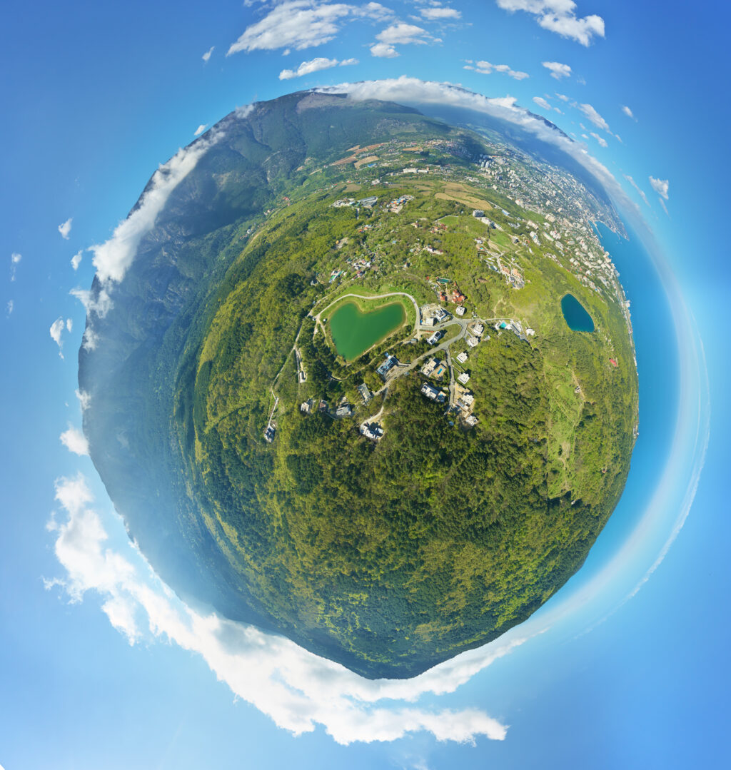 Little planet panorama of spring mountain forest, and magabi lak